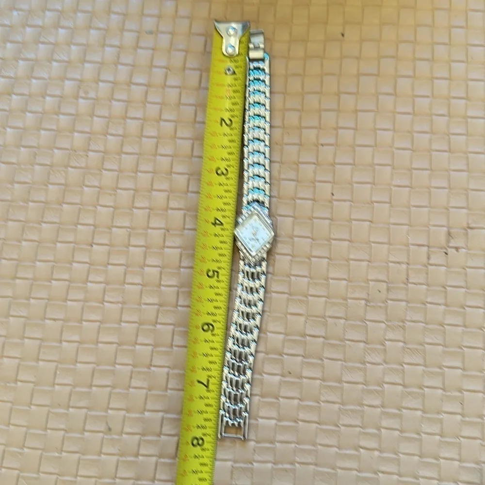 Elegant silver tone diamond face quartz cocktail watch